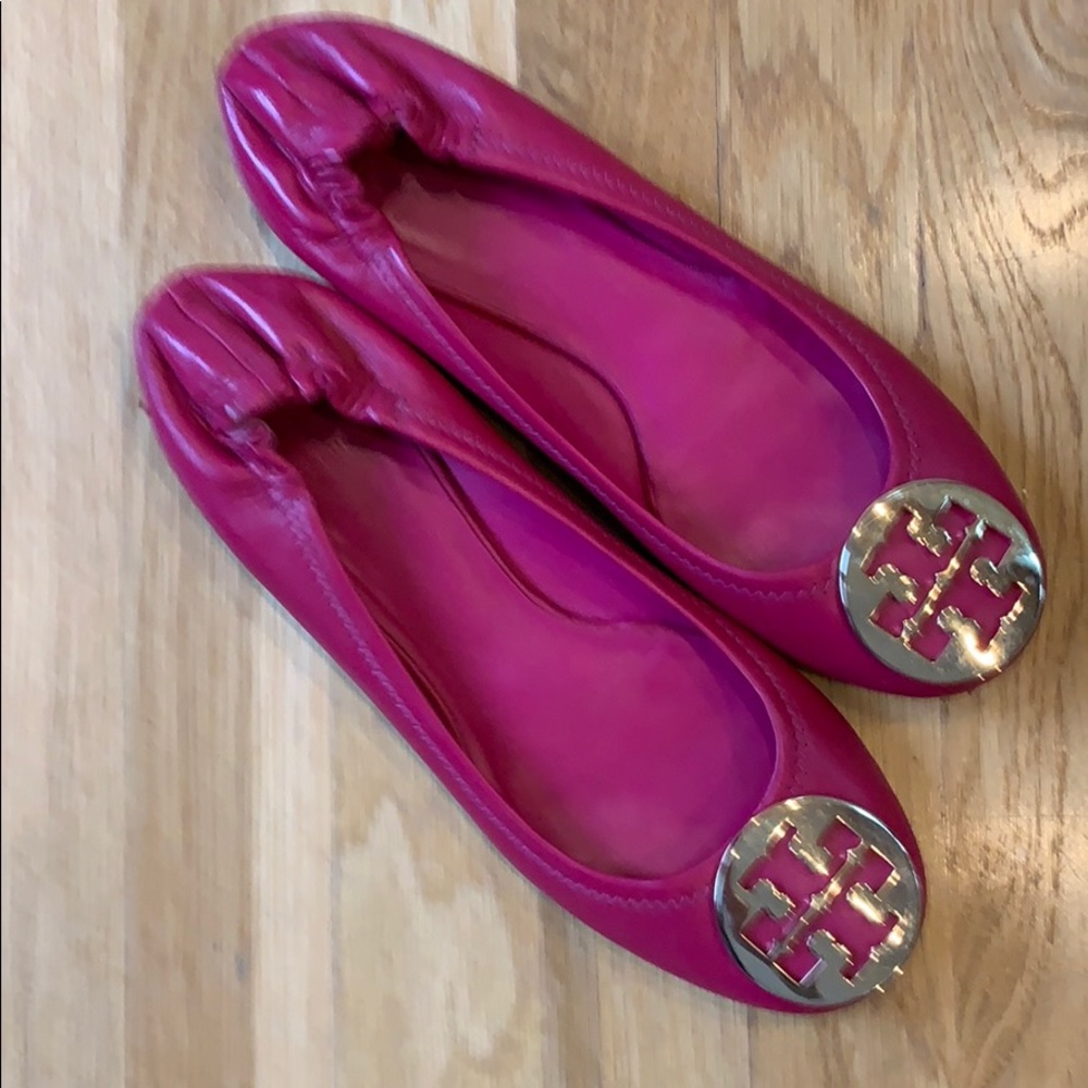 Pink Tory flats gold emblem